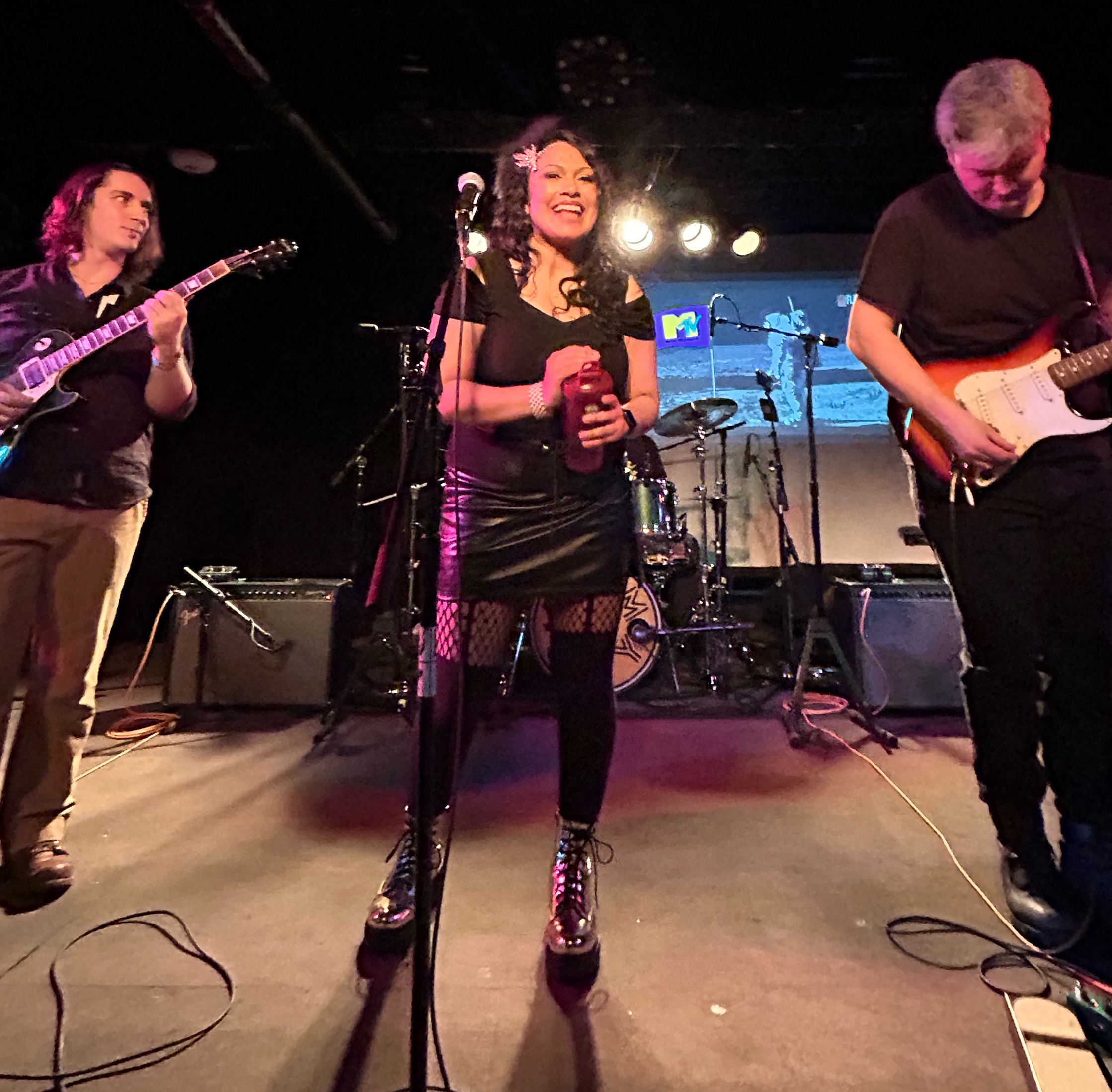 Syeda performing with band